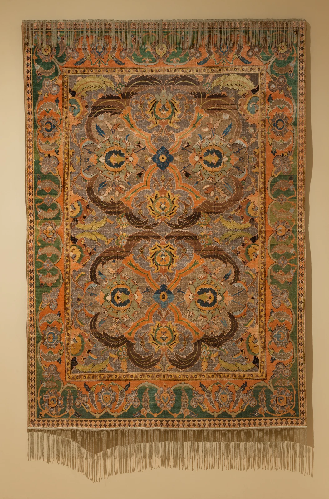 Historic Persian silk carpet with an intricate floral field